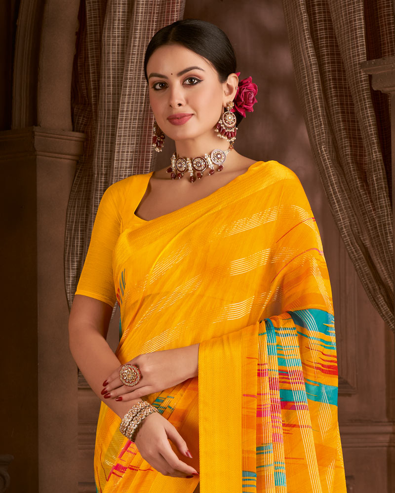 Vishal Prints Golden Yellow Printed Patterned Chiffon Saree With Weaved Satin Patta And Tassel