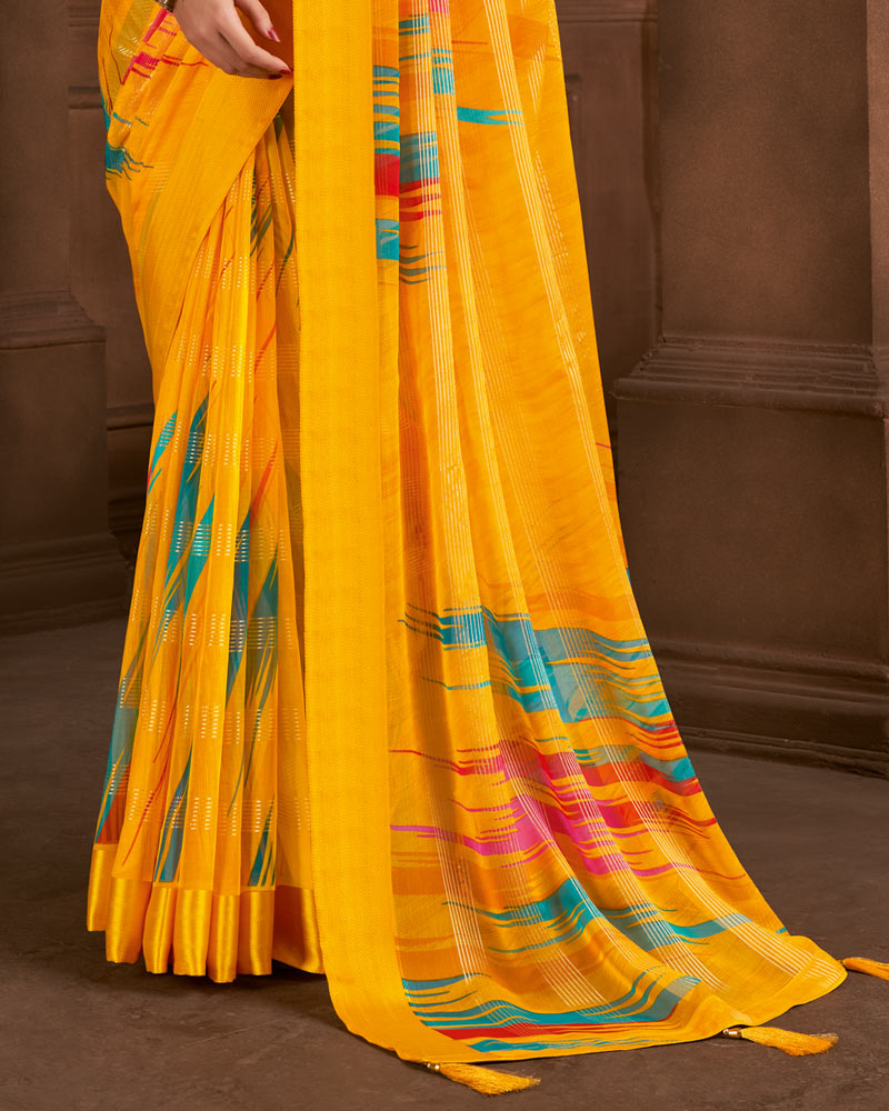 Vishal Prints Golden Yellow Printed Patterned Chiffon Saree With Weaved Satin Patta And Tassel