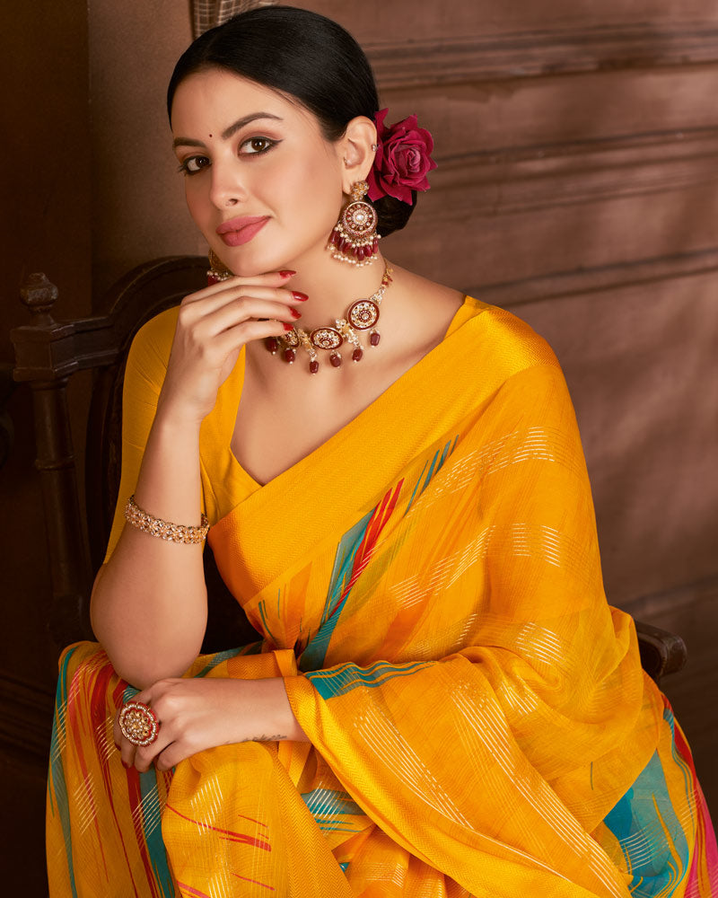 Vishal Prints Golden Yellow Printed Patterned Chiffon Saree With Weaved Satin Patta And Tassel