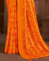 Vishal Prints Blaze Orange Printed Patterned Chiffon Saree With Weaved Satin Patta And Tassel