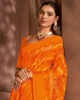 Vishal Prints Blaze Orange Printed Patterned Chiffon Saree With Weaved Satin Patta And Tassel