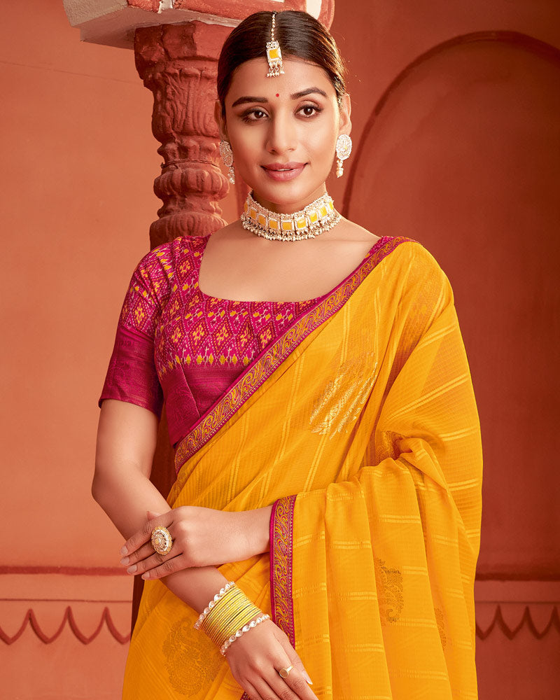 Vishal Prints Yellowish Orange Patterned Chiffon Saree With Foil Print And Zari Border