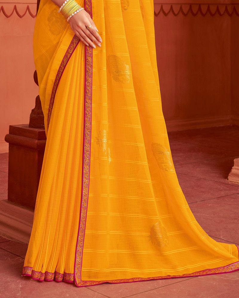 Vishal Prints Yellowish Orange Patterned Chiffon Saree With Foil Print And Zari Border
