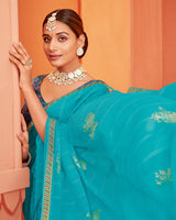 Vishal Prints Dark Turquoise Blue Patterned Chiffon Saree With Foil Print And Zari Border