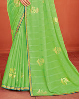 Vishal Prints Light Moss Green Patterned Chiffon Saree With Foil Print And Zari Border