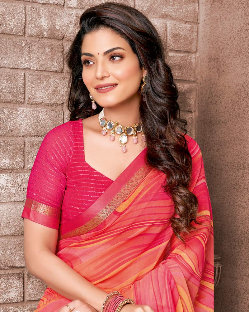 Vishal Prints Pastel Orange Printed Georgette Saree With Fancy Border