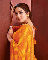Vishal Prints Orange And Yellow Chiffon Saree With Zari Border