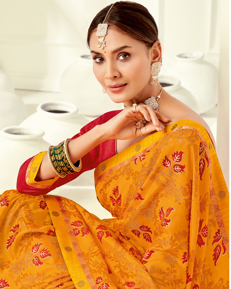 Vishal Prints Yellowish Orange Printed Silk Brasso Saree With Foil Print And Fancy Border