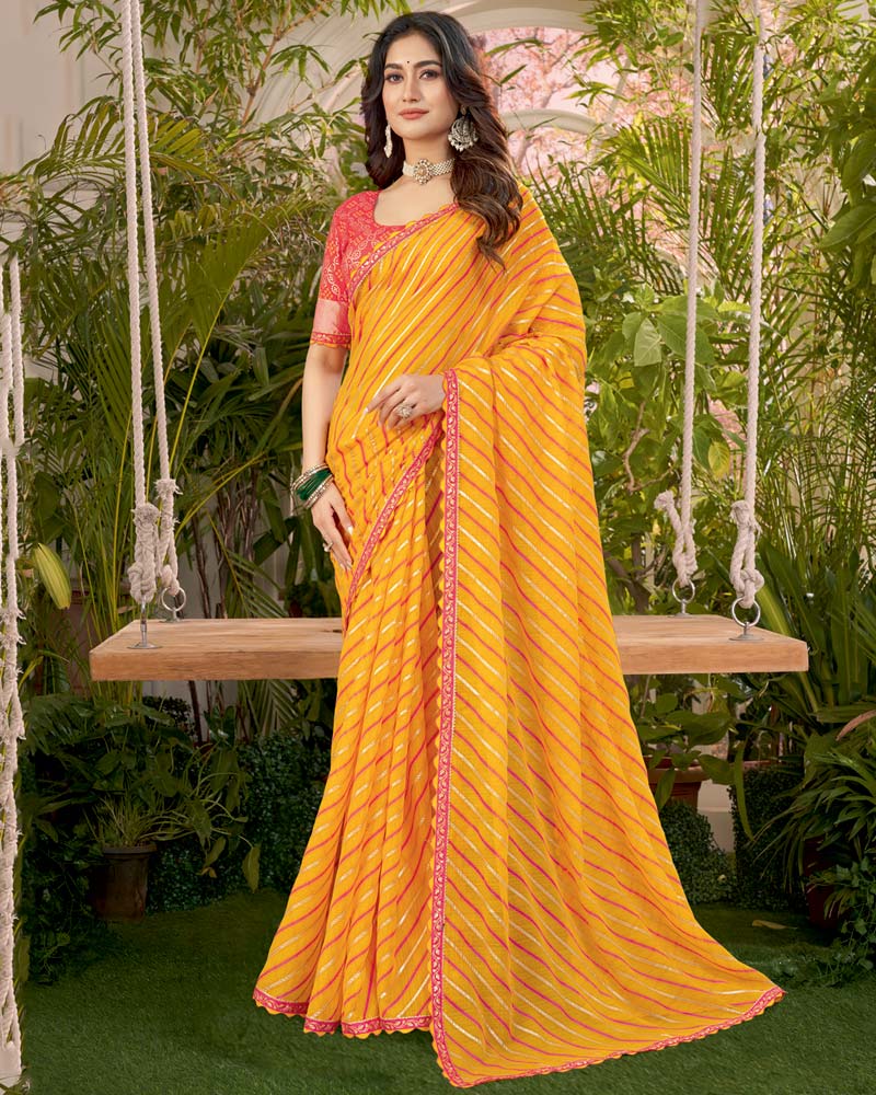 Vishal Prints Yellowish Orange Printed Fancy Chiffon Traditional Print Saree With Foil Print And Cut Work Border