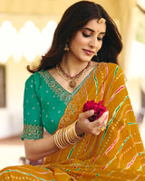 Vishal Prints Deep Mustard Traditional Printed Fancy Chiffon Saree With Foil Print And Cut Work Embroidery Border