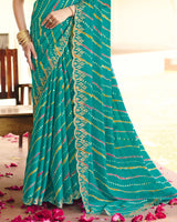 Vishal Prints Teal Blue Traditional Printed Fancy Chiffon Saree With Foil Print And Cut Work Embroidery Border