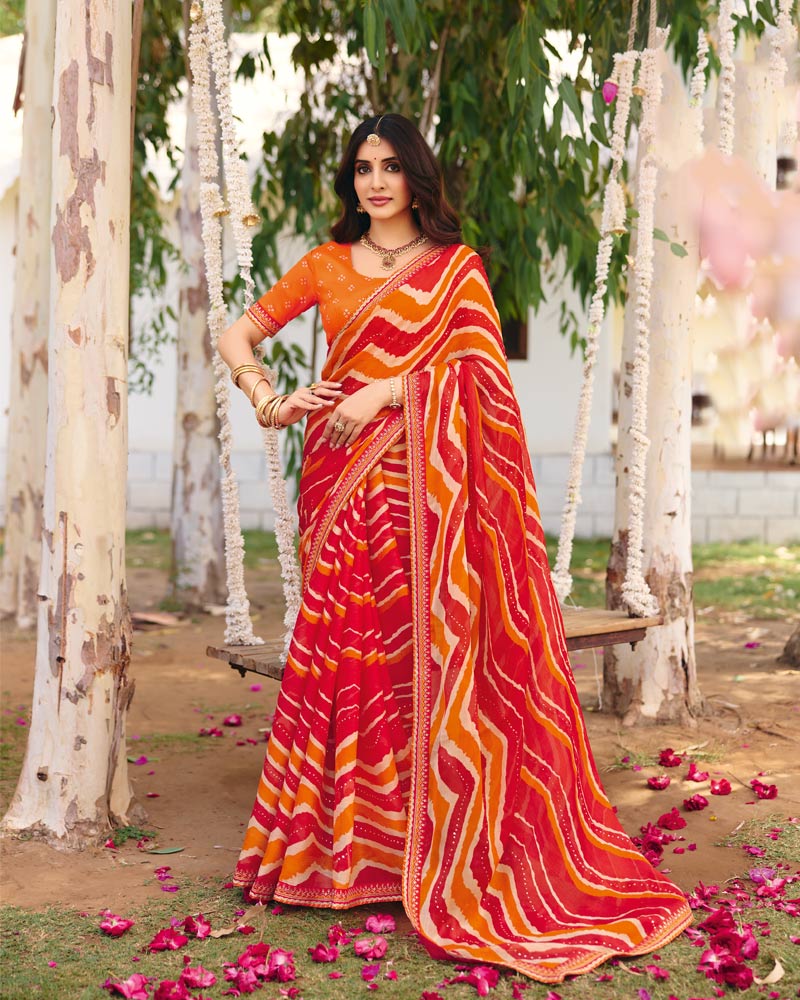 Vishal Prints Orange Red Traditional Printed Fancy Chiffon Saree With Foil Print And Embroidery Border