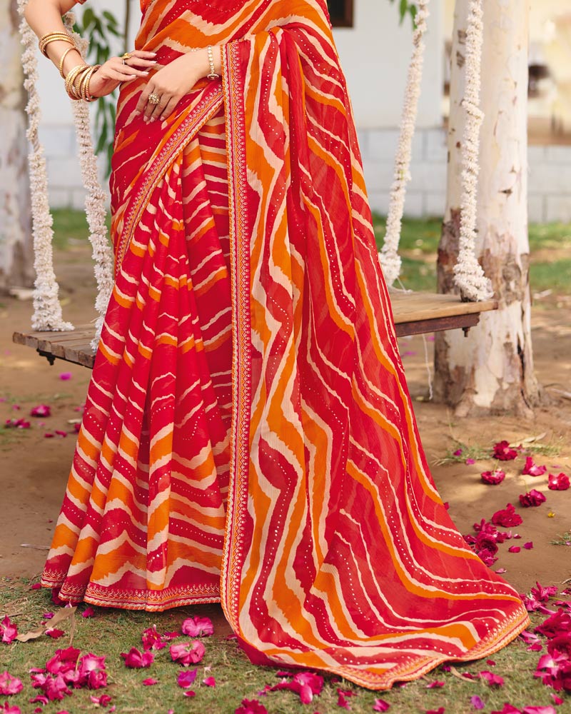 Vishal Prints Orange Red Traditional Printed Fancy Chiffon Saree With Foil Print And Embroidery Border