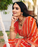 Vishal Prints Bright Orange Traditional Printed Fancy Chiffon Saree With Foil Print And Embroidery Border