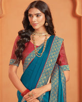 Vishal Prints Peacock Blue Designer Chiffon Saree With Foil Print And Zari Border