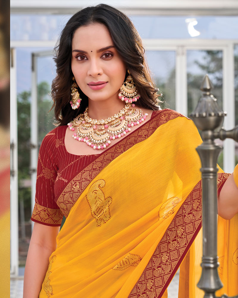 Vishal Prints Yellowish Orange Chiffon Saree With Foil Print And Zari Border