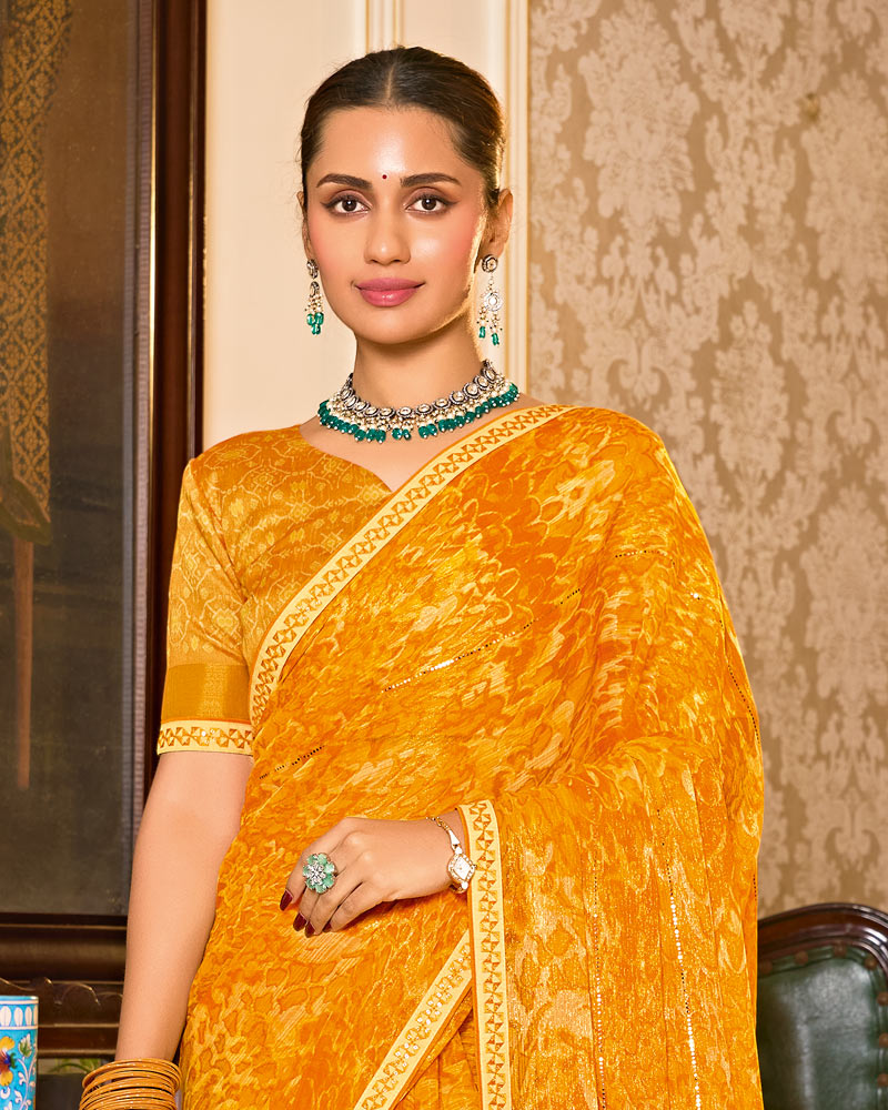 Vishal Prints Yellowish Orange Designer Shimmer-Chiffon Saree With Tikli Work And Fancy Embroidery Border