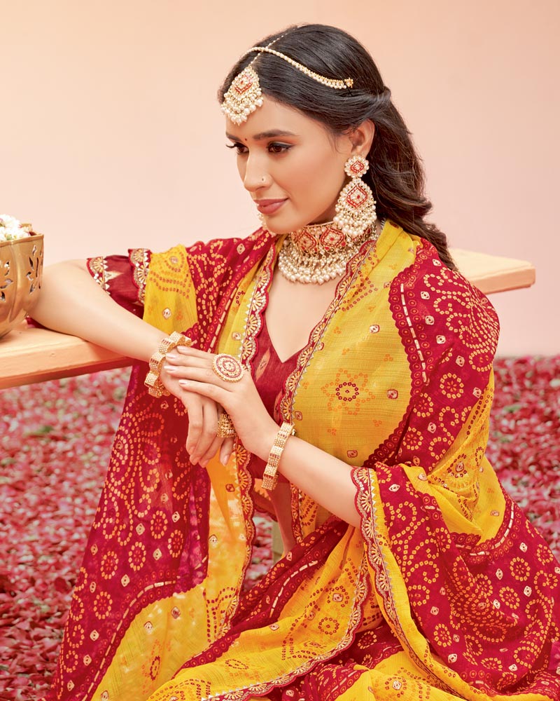 Vishal Prints Dark Yellow And Red Printed Fancy Chiffon Traditional Print Saree With Foil Print And Cut Work Border