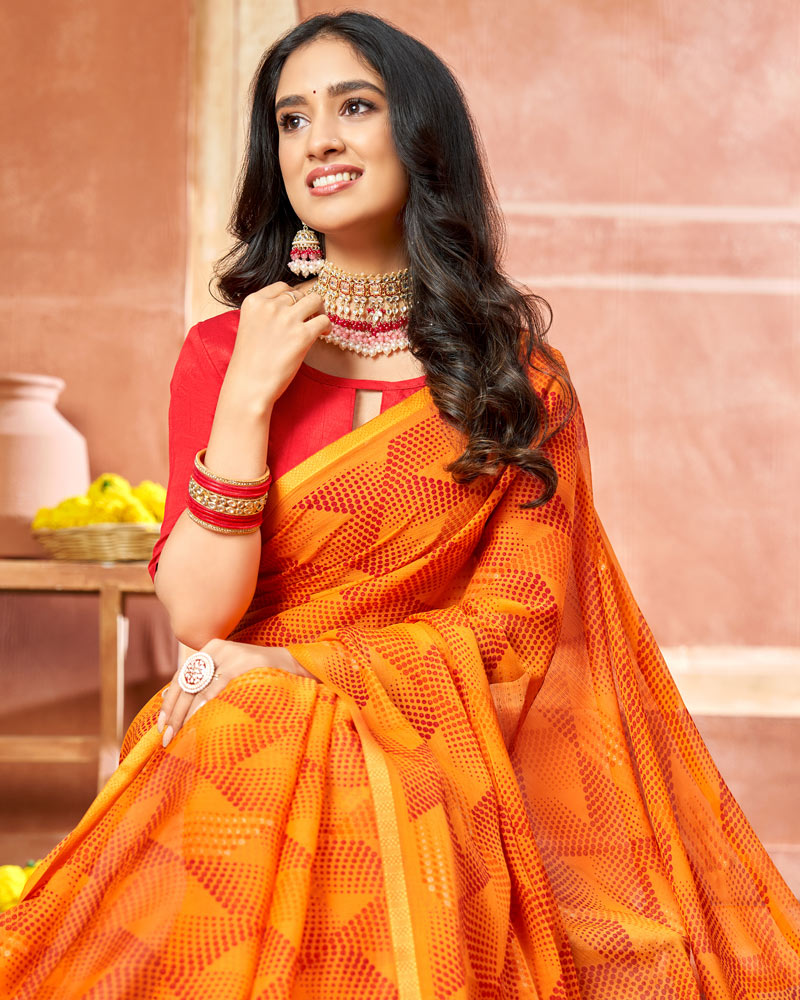 Vishal Prints Orange Printed Chiffon Saree With Foil Print And Tassel