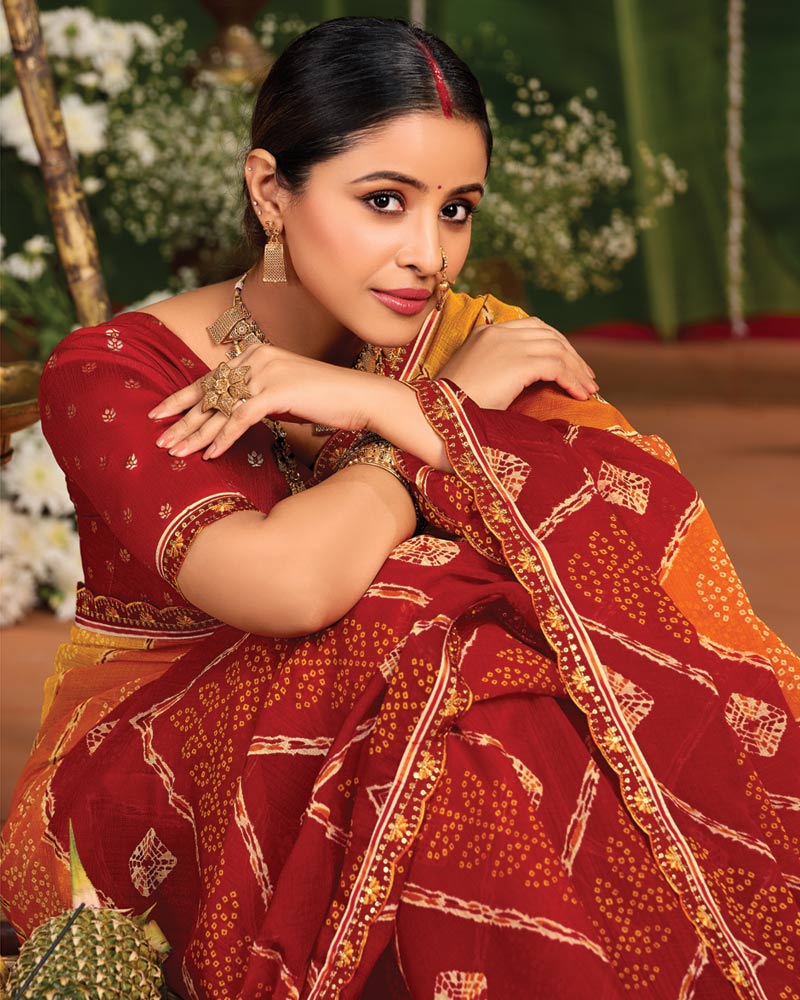 Vishal Prints Pumpkin Orange And Brick Red Printed Chiffon Traditional Print Saree With Cut Work Embroidery Border