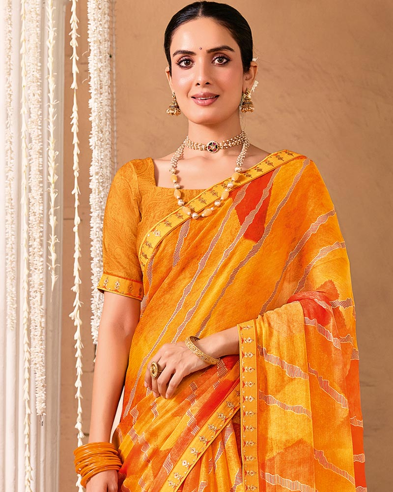 Vishal Prints Yellowish Orange Designer Shimmer-Chiffon Saree With Foil Print And Fancy Embroidery Border