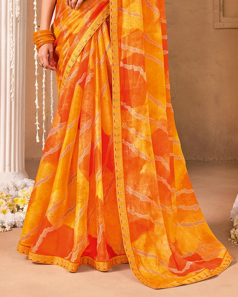 Vishal Prints Yellowish Orange Designer Shimmer-Chiffon Saree With Foil Print And Fancy Embroidery Border
