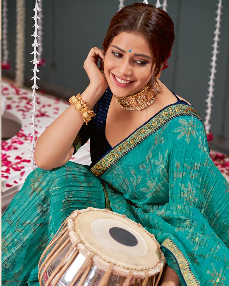 Vishal Prints Teal Blue Crushed Brasso Saree With Foil Print And Zari Border