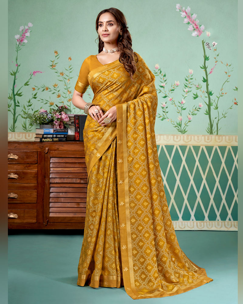 Vishal Prints Mustard Brown Printed Brasso Saree With Foil Print And Fancy Border