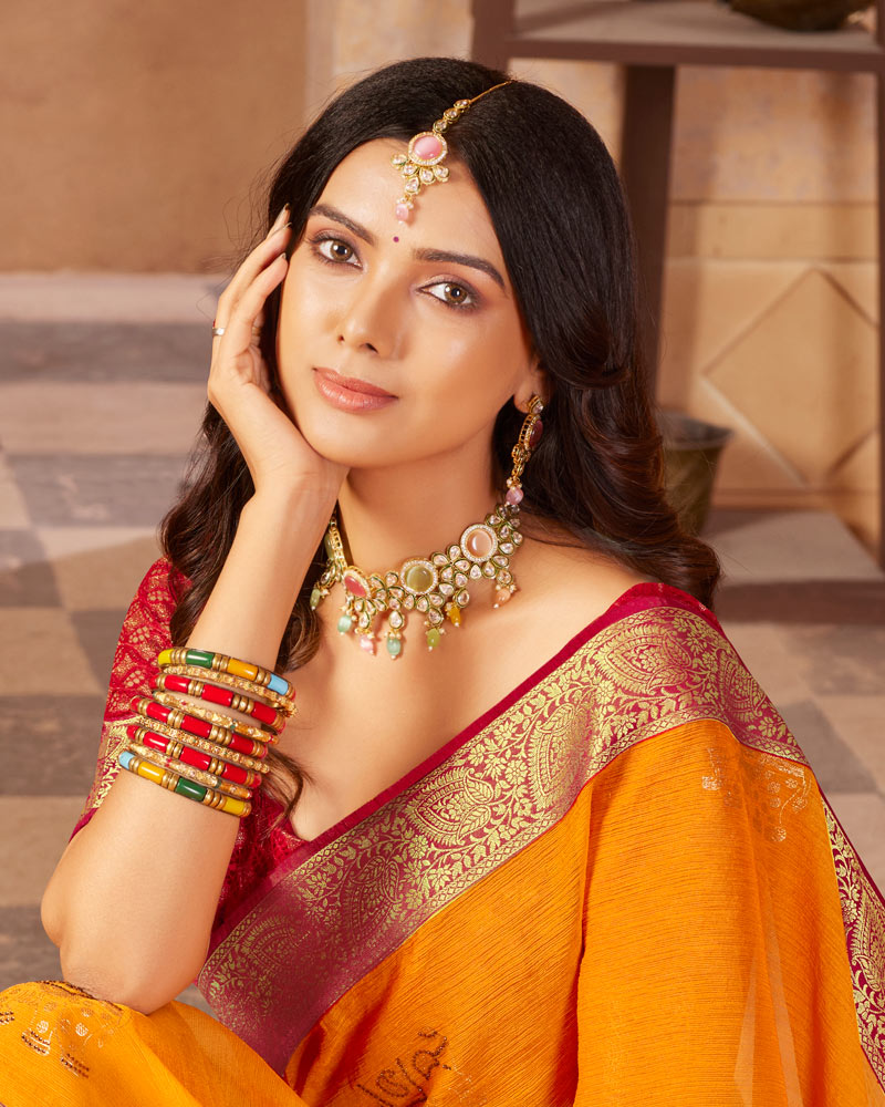 Vishal Prints Orange Chiffon Saree With Foil Print And Zari Border