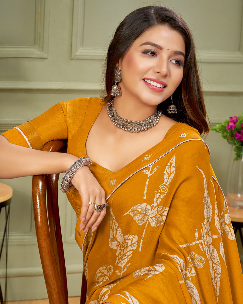 Vishal Prints Ochre Printed Criva Crepe Saree With Fancy Border