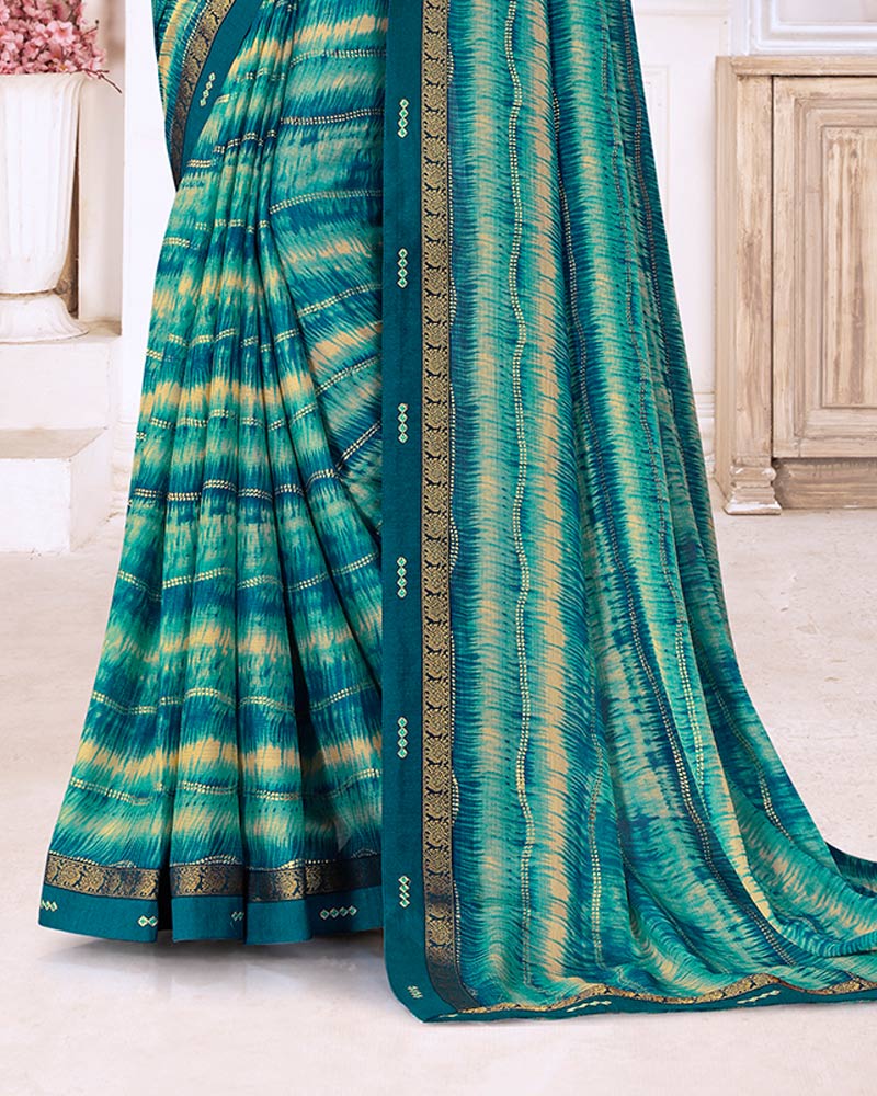 Vishal Prints Teal Blue Printed Chiffon Saree With Foil Print And Fancy Border