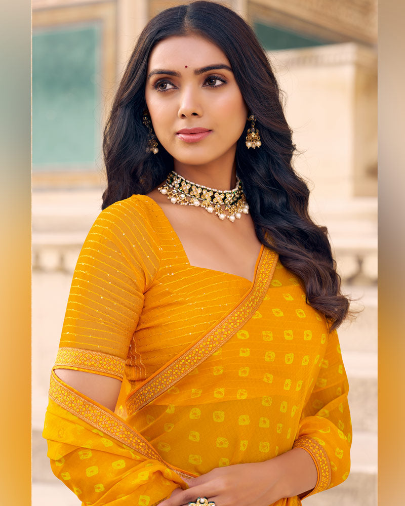 Vishal Prints Dark Yellow Printed Chiffon Saree With Fancy Border