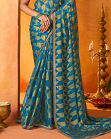 Vishal Prints Ocean Blue And Greenish Beige Printed Chiffon-Brasso Saree With Fancy Border