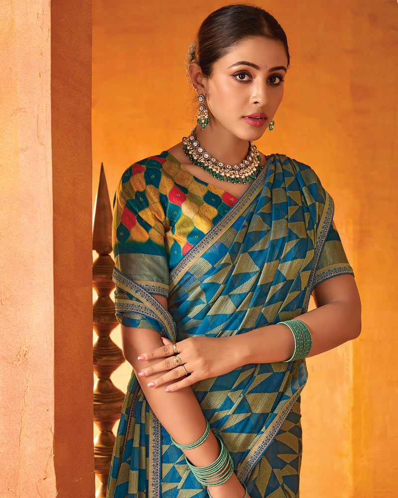 Vishal Prints Ocean Blue And Greenish Beige Printed Chiffon-Brasso Saree With Fancy Border