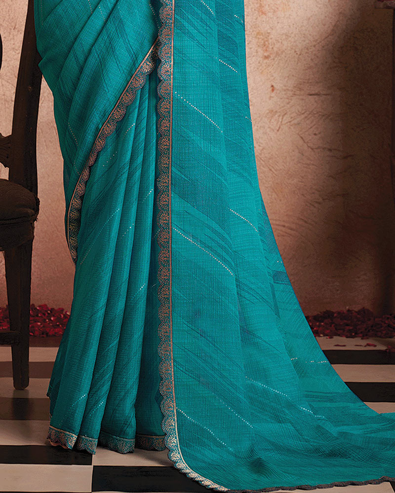 Vishal Prints Teal Blue Printed Luxury Chiffon Saree With Foil Print And Cut Work Embroidery Border