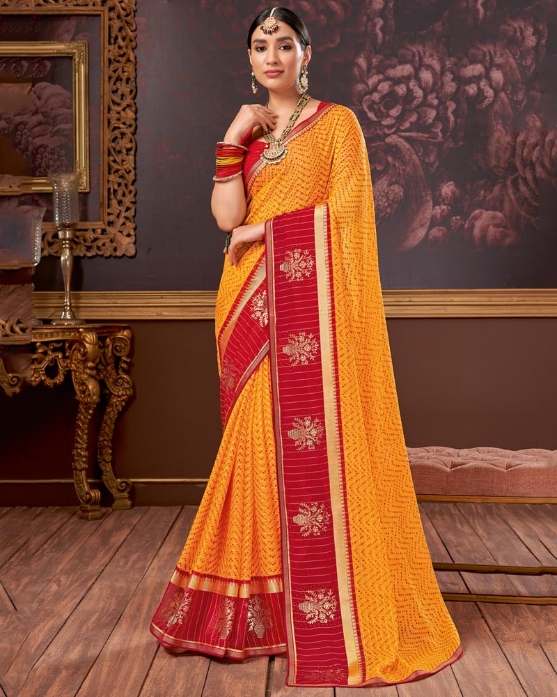 Vishal Prints Yellowish Orange Chiffon Saree With Foil Print And Zari Border