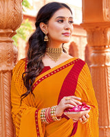 Vishal Prints Orange Printed Georgette Saree With Foil Print And Fancy Border