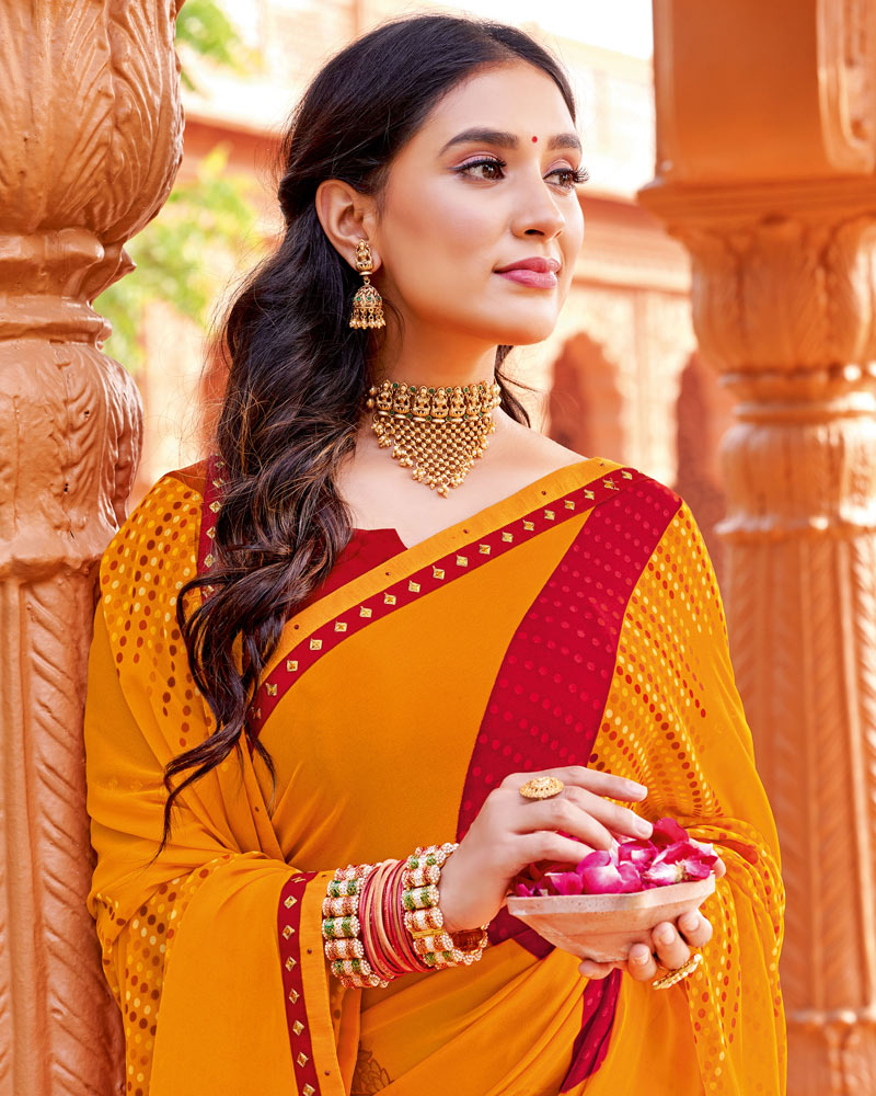 Vishal Prints Orange Printed Georgette Saree With Foil Print And Fancy Border