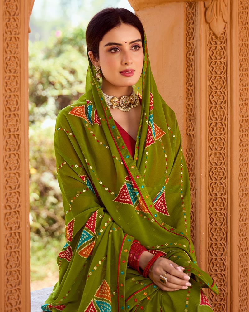 Vishal Prints Olive Green Printed Georgette Saree With Foil Print And Fancy Border