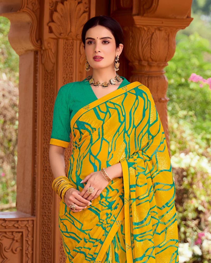 Vishal Prints Mustard Yellow Printed Georgette Saree With Foil Print And Fancy Border