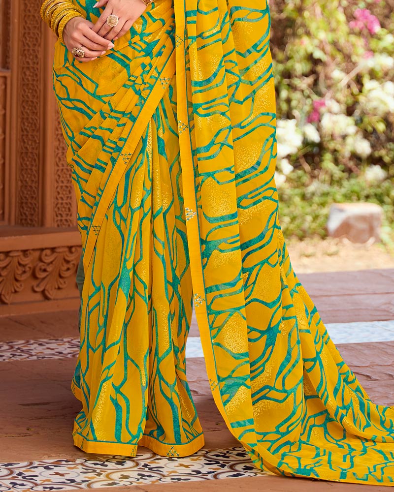Vishal Prints Mustard Yellow Printed Georgette Saree With Foil Print And Fancy Border