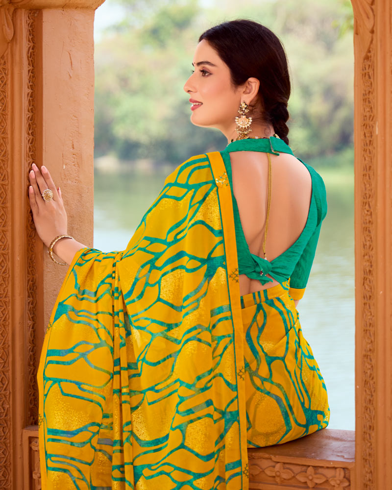 Vishal Prints Mustard Yellow Printed Georgette Saree With Foil Print And Fancy Border