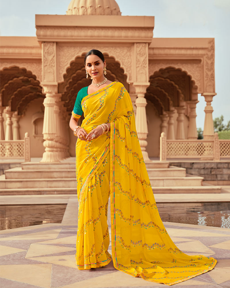 Vishal Prints Burnt Yellow Printed Georgette Saree With Foil Print And Fancy Border