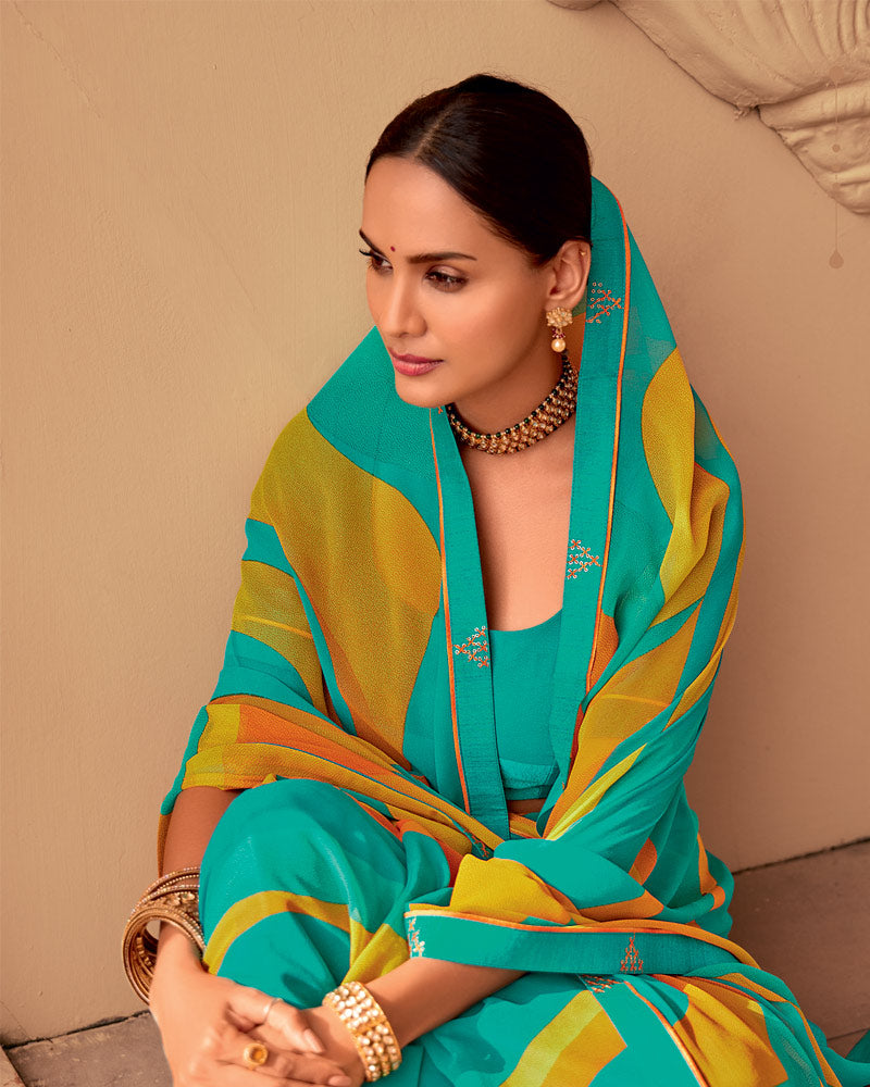 Vishal Prints Aqua Green And Burnt Orange Printed Georgette Saree With Fancy Border