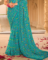 Vishal Prints Teal Blue Printed Georgette Saree With Fancy Border