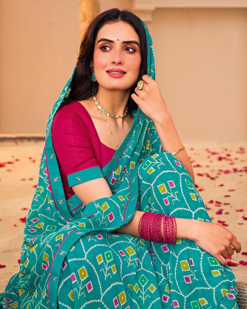 Vishal Prints Teal Blue Printed Georgette Saree With Fancy Border