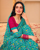 Vishal Prints Teal Blue Printed Georgette Saree With Fancy Border