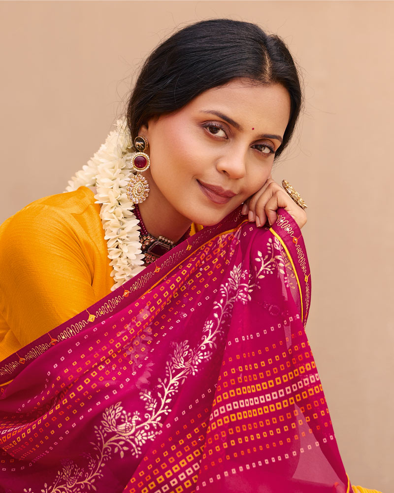 Vishal Prints Rani Pink Traditional Print Georgette Saree With Foil Print And Fancy Border