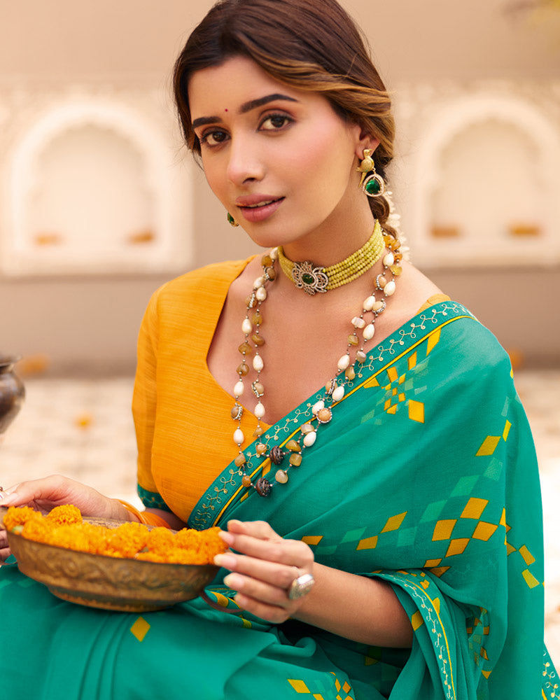 Vishal Prints Teal Green Printed Georgette Saree With Fancy Border