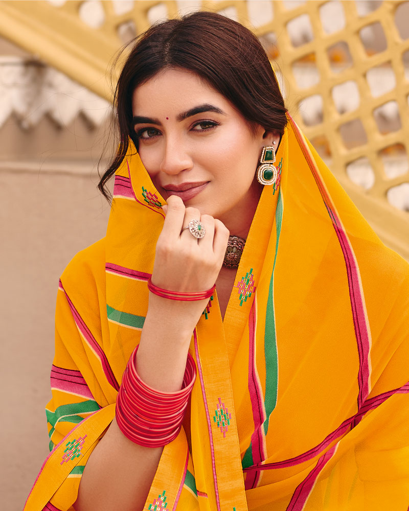 Vishal Prints Mustard Printed Georgette Saree With Foil Print And Fancy Border